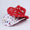 Plush Christmas Hat with Gold Feather and Snowflake Print