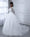 Sheer Neck Tulle Ball Gown Wedding Dresses with Long Sleeves & Appliques
